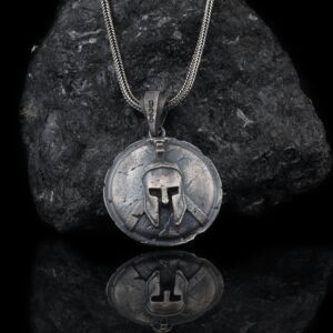 The Spartan Shield Necklace is a product of high class craftsmanship and intricate designing. It's solid structure makes it a perfect piece to use as an everyday jewelry to elevate your style.