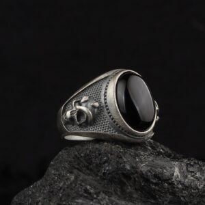 The Skull Ring with Black Stone is a product of high class craftsmanship and intricate designing. It's solid structure makes it a perfect piece to use as an everyday jewelry to elevate your style.