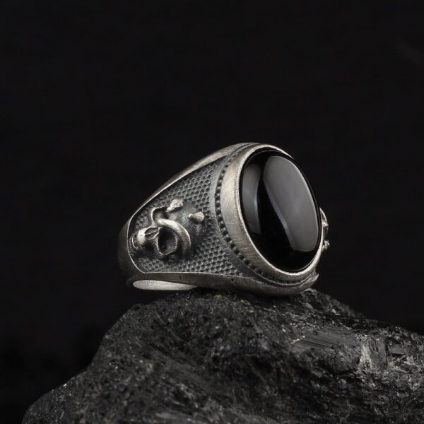 the skull ring with black stone is a product of high class craftsmanship and intricate designing. it's solid structure makes it a perfect piece to use as an everyday jewelry to elevate your style.