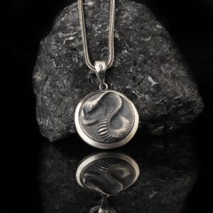 The Snake Medallion Sterling Silver is a product of high class craftsmanship and intricate designing. It's solid structure makes it a perfect piece to use as an everyday jewelry to elevate your style.