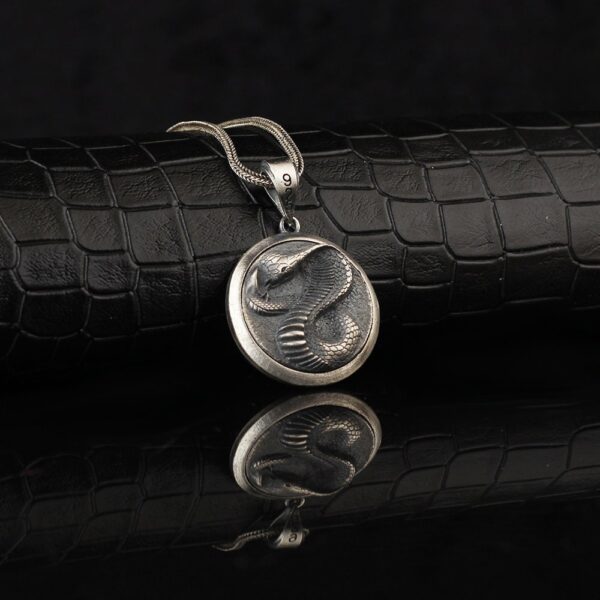 the snake medallion sterling silver is a product of high class craftsmanship and intricate designing. it's solid structure makes it a perfect piece to use as an everyday jewelry to elevate your style. espada silver