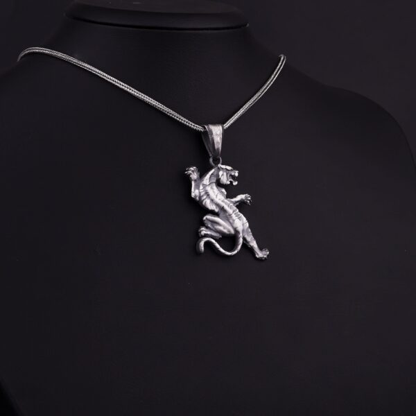 the white tiger necklace is a product of high class craftsmanship and intricate designing. it's solid structure makes it a perfect piece to use as an everyday jewelry to elevate your style. espada silver