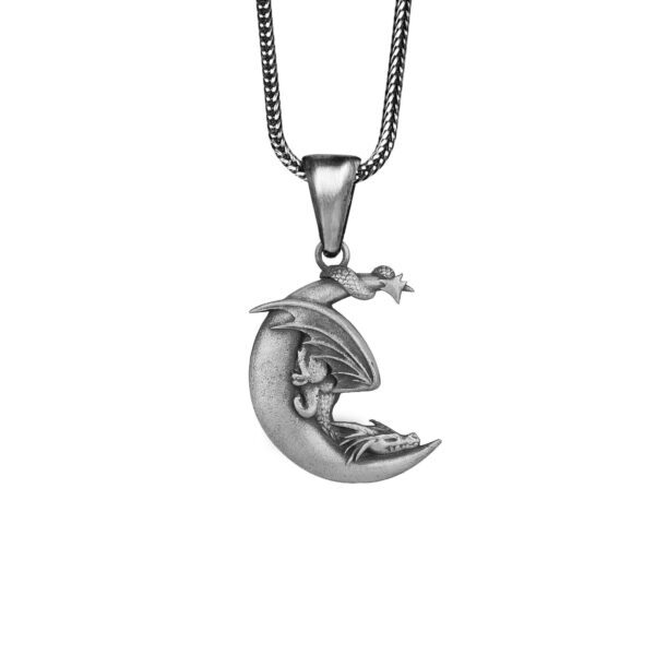 the moon dragon necklace is a product of high class craftsmanship and intricate designing. it's solid structure makes it a perfect piece to use as an everyday jewelry to elevate your style. espada silver